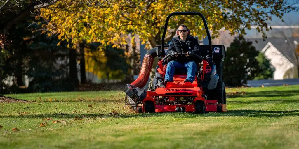 man operating gravely ride-on mower